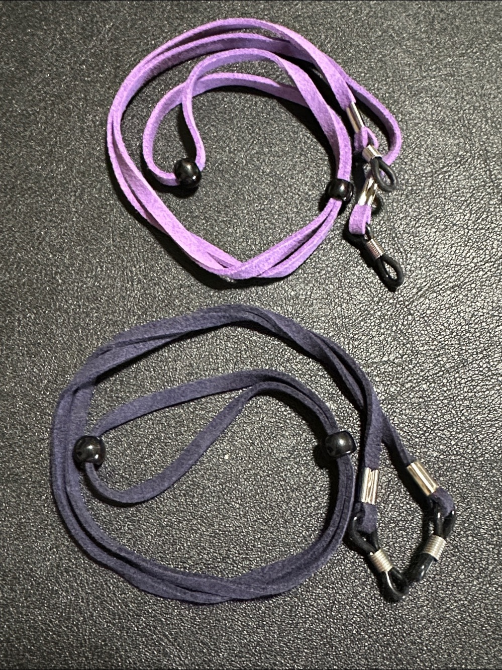 206.  Two NEW Suede Eye Glass Holders